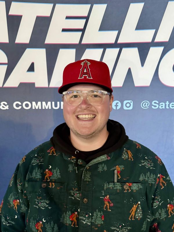 Mike Billau director of online ministries at Satellite Gaming wearing a tux and a boutonniere