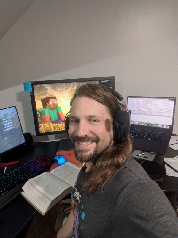 Mike Billau director of online ministries at Satellite Gaming wearing a tux and a boutonniere